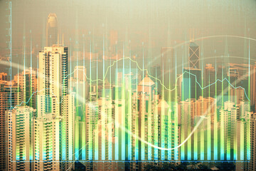 Naklejka na ściany i meble Forex chart on cityscape with skyscrapers wallpaper double exposure. Financial research concept.
