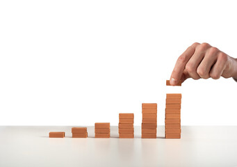 Statistics built with bricks. concept of success, statistic and profit