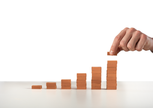 Statistics built with bricks. concept of success, statistic and profit