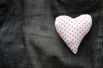 Heart on jeans. Big love concept.