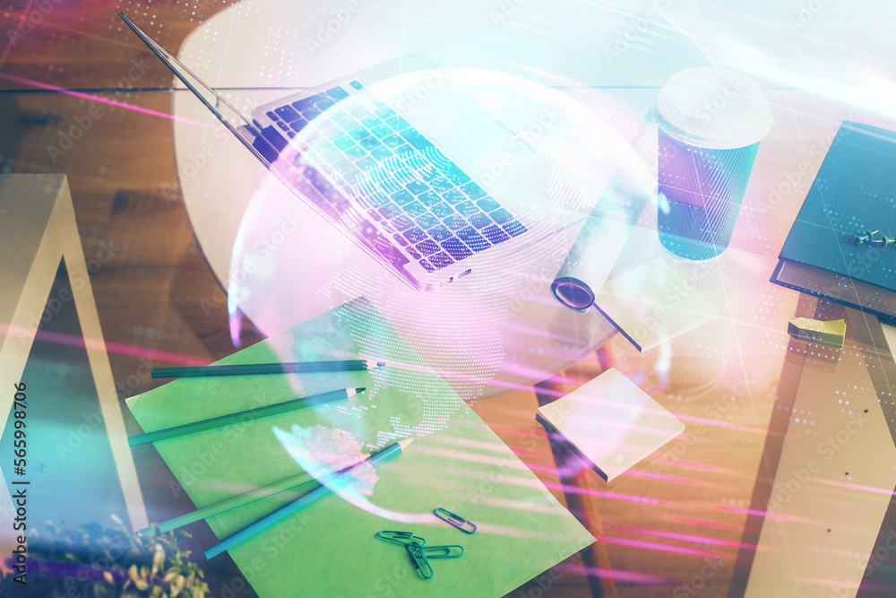 Poster Computer on desktop in office with technology theme hologram. Double exposure. Tech concept.