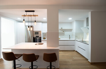 Fototapeta na wymiar perfectly equipped modern kitchen in a home