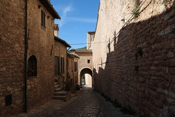 Archway in a old narrow alley in Spello, Umbria Italy