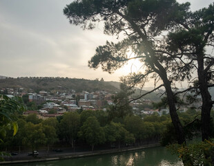 Fototapeta premium Sunset in Tbilisi, view from the hill