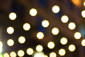 Fototapeta na wymiar Blurred background, bokeh with colorful lights, festive lighting
