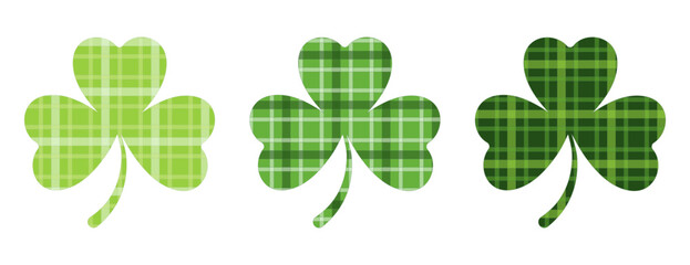 Clip art set of Irish clover leaves in plaid textures in in green colours and Isolated background. Hand drawn design for St. Patrick’s day celebration, party decoration, scrapbooking, home decor.