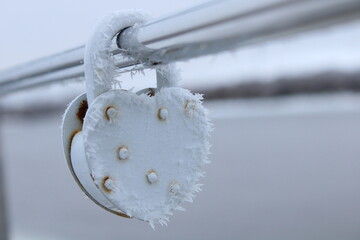 lock in snow on bridge at winter