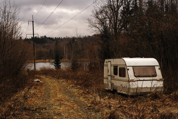abandoned trailer in the forest