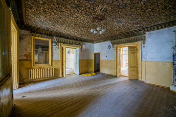 An old school in an abandoned manor house in central Poland, Europe in autumn