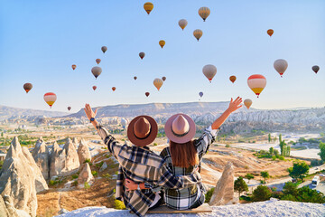 Couple travelers vacations together in beautiful destination in Goreme, Turkey. Fabulous Kapadokya...