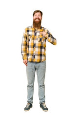 Young adult redhead man with a long beard standing full body isolated person pointing by hand to a shirt copy space, proud and confident