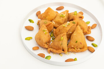Samosa Gujia Mithai Also Called Gujiya, Pirukiya, Pirukia, Pedakiya, Karanji, Basundi Gughra Made Of Suji Ghee Stuffed With Mawa Khoya Chasni Mava Khoa Is Enjoyed On Deepawali, Teez, Holi And Teej