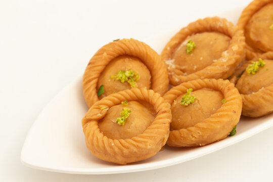 Chandrakala Gujia Mithai Also Called Suryakala Gujiya, Pirukiya, Pirukia, Pedakiya, Karanji, Basundi Gughra Made Of Suji Ghee Stuffed With Mawa Khoya Chasni Mava Khoa For Deepawali, Teez, Holi, Teej