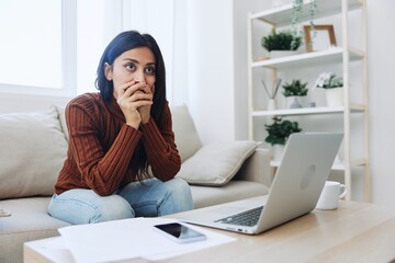 Woman working from home freelance in laptop online, overwork and fall depression