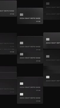 Credit card motion graphics. Moving pattern of black bank cards. Dark background.