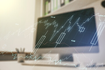 Multi exposure of abstract financial diagram and modern desk with computer on background, banking and accounting concept