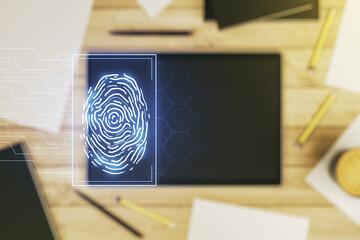 Abstract creative fingerprint illustration and modern digital tablet on desktop on background, top view, personal biometric data concept. Multiexposure