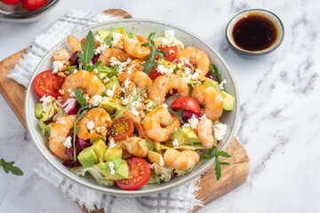 Avocado shrimp salad with cherry tomatoes
