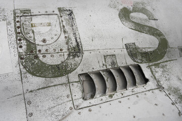 detail of a weathered fighter jet hull