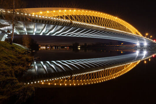 illuminated road and tram bridge over the Vltava in Prague
