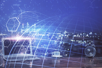 Multi exposure of table with computer and world map hologram. International data network concept.
