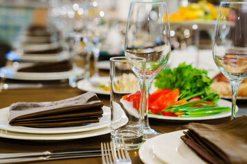 a festive served table with snacks and tableware.