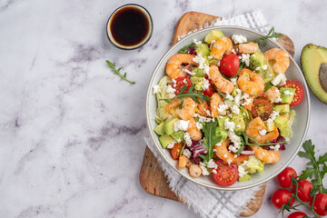 Avocado shrimp salad with cherry tomatoes