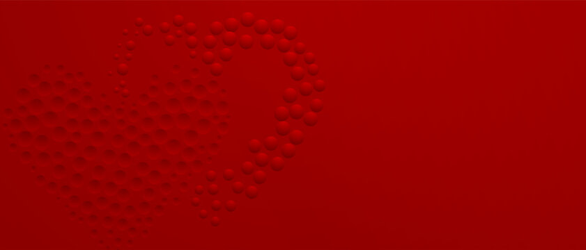 Abstract background in red colors with many convex and concave small circles, arranged in a heart shape