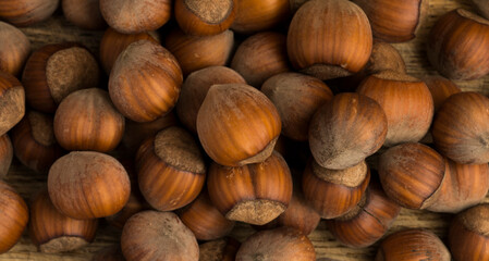 beautiful hazelnuts on a wooden background close-up