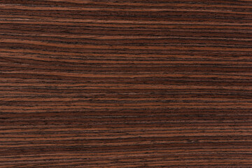 Rosewood texture. Texture of dark mahogany with an intense pattern, natural rosewood veneer for the...