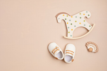 Gender neutral baby shoes, rocking horse and teether. Organic newborn fashion, branding, small...