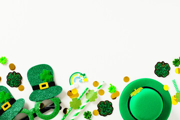 Happy St Patrick's Day banner template. Flat lay composition with leprechauns hat, party...
