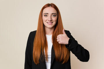 Young business caucasian redhair woman smiling and raising thumb up