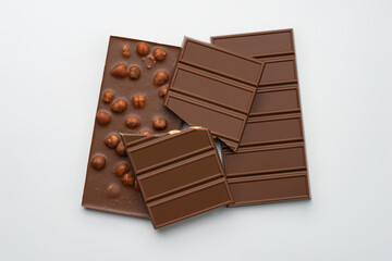milk chocolate with nuts on a white background