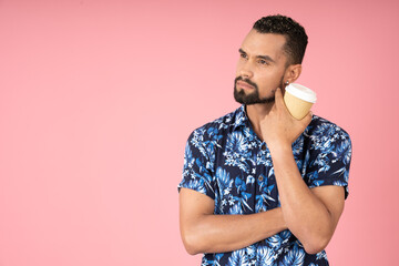 Thoughtful man drinking a cup of coffee