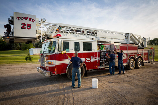 Firetruck washed by firefighters, New Holstein, Wisconsin, USA