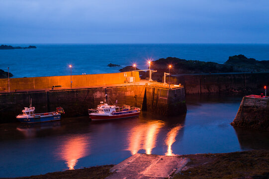 Evening descends on the harbour and village of St. Abbs in North East England.