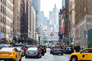 Rush hour traffic jam with taxis and cars merging on Varick Street towards the Holland Tunnel in...