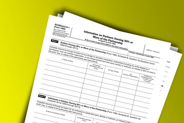 Obraz premium Form 1065 (Schedule B-1) documentation published IRS USA 43810. American tax document on colored