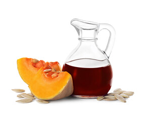 Fresh pumpkin seed oil in glass jug isolated on white