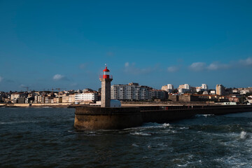 View of the ocean lighthouse on the coast in Porto, Portugal.