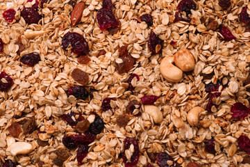 Sweet tasty granola as background, top view