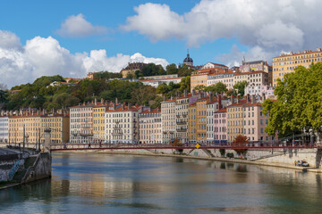 Fototapeta na wymiar Beautiful riverfront buildings in Lyon France