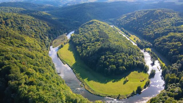 Aerial view of Ardennes forest in belgium orbit wide shot 