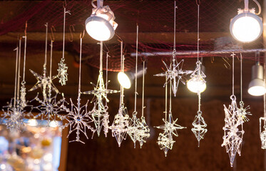 Glass decorations in the form of snowflakes and figurines