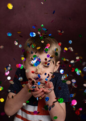 child playing with glitter