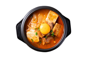 Korean food, Kimchi soup with tofu, pork and fresh egg yolk in Korean stone pot