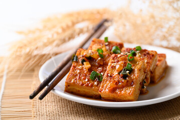 Korean side dish, spicy braised tofu (Dubu Jorim)