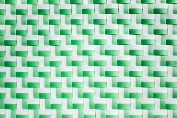Green plastic woven basket pattern background texture