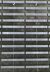 Obraz premium looking down on solar panels in vertical view
